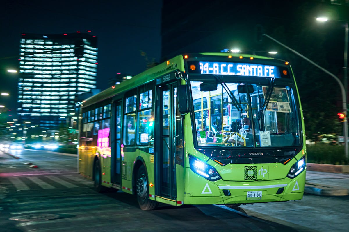 Public bus on a Mexico City street at night