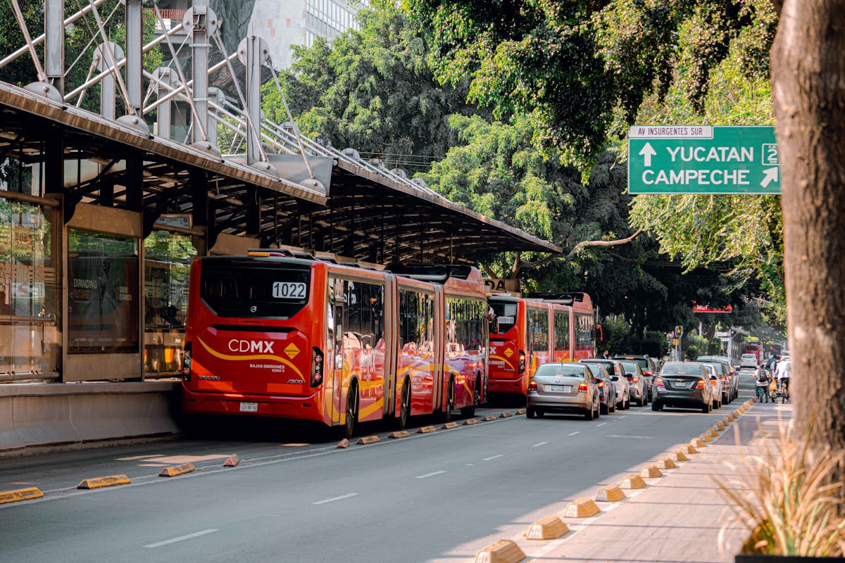 Red buses at a Mexico City transit station